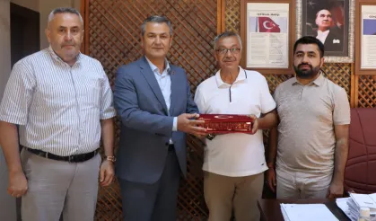Kocaeli İzmit'te muhtarlara doğum günü ziyareti